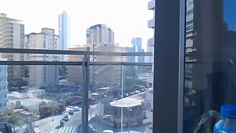 Sensual Gamer Shows Off Clothes Outdoors On Balcony